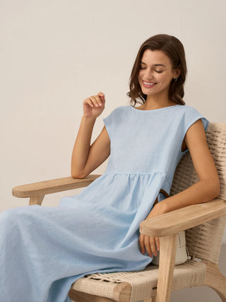 LINTICO blue linen maxi dress with cap sleeves, washed finish, featuring a relaxed, flowy midi dress design.