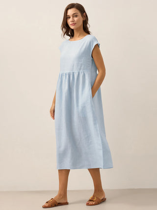 LINTICO Joan 100% linen cap sleeve washed maxi dress in baby blue, featuring a flowing midi-length design and relaxed fit.