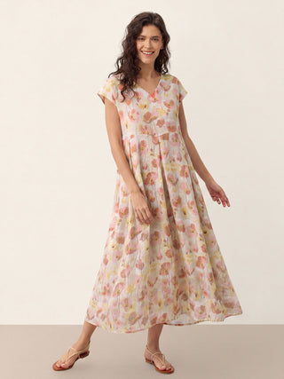 Linen maxi dress with carnation print and scalloped waist, HARRIET style in garden blush by LINTICO, featuring a flowing midi length.