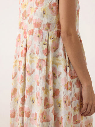 Linen maxi dress with carnation print, scalloped waist detail, by LINTICO, in a garden blush color, perfect for summer wear.