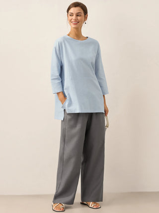 Neutral grey linen classic pants by LINTICO, featuring a relaxed fit and tailored design perfect for casual or office wear.