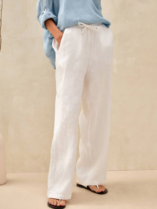 LINTICO 100% linen classic white pants with a relaxed fit, front pockets, and a tailored waistband, perfect for casual or dressy wear.