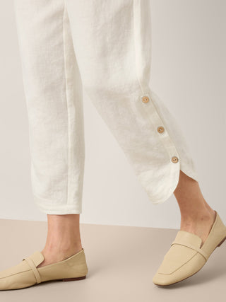 LINTICO Lindsey white linen pull-on pants with double pleats and button hem, casual and comfortable bottoms for everyday wear.