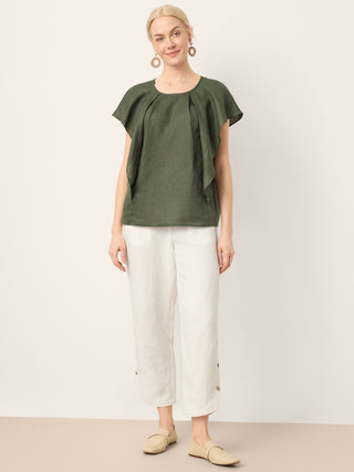 LINTICO Lindsey 100% linen double pleat pull-on pants in optic white, featuring button hem and relaxed fit.