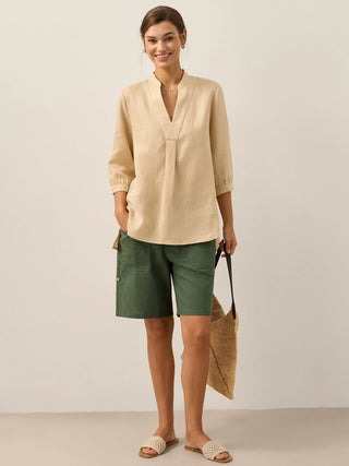 LINTICO Joanna 100% linen dress shirt in butter yellow, showcasing a relaxed fit blouse with a classic collar and button front.