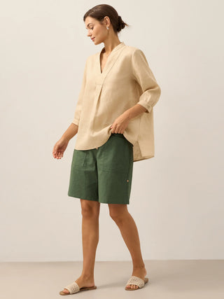 LINTICO Joanna butter yellow 100% linen dress shirt, a stylish blouse with a relaxed fit and natural linen fabric.
