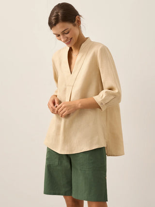 Light yellow linen dress shirt for women, Joanna style by LINTICO, with a relaxed fit and button-up front.