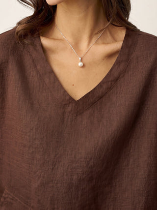 LINTICO 100% linen drop shoulder top with asymmetric layered hem in espresso brown, casual and stylish layered shirt.