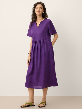 Dark purple linen maxi dress with embroidered cuffs and split neck, stylish and comfortable, by LINTICO.