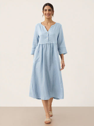 Baby blue linen maxi dress by LINTICO with loose fit, button waist, and gathered design, perfect for casual summer wear.