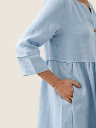 Baby blue linen maxi dress with a loose fit, button waist, and gathered details by LINTICO, perfect for casual summer wear.
