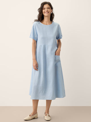 LINTICO Morgan baby blue linen midi dress with pinstripe panels and short sleeves, stylish and breathable for warm weather.