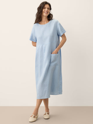 LINTICO Morgan linen midi dress with pinstripe panels, short sleeves, in baby blue, featuring a relaxed, stylish fit.