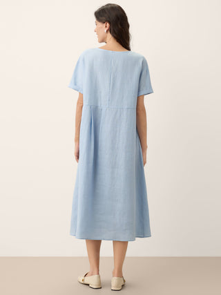LINTICO Morgan baby blue linen short-sleeved midi dress with pinstripe panels, perfect for warm weather and casual elegance.
