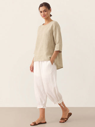 LINTICO Brianna khaki linen top with round neck and asymmetrical hem, casual blouse for women, stylish and breathable fabric.