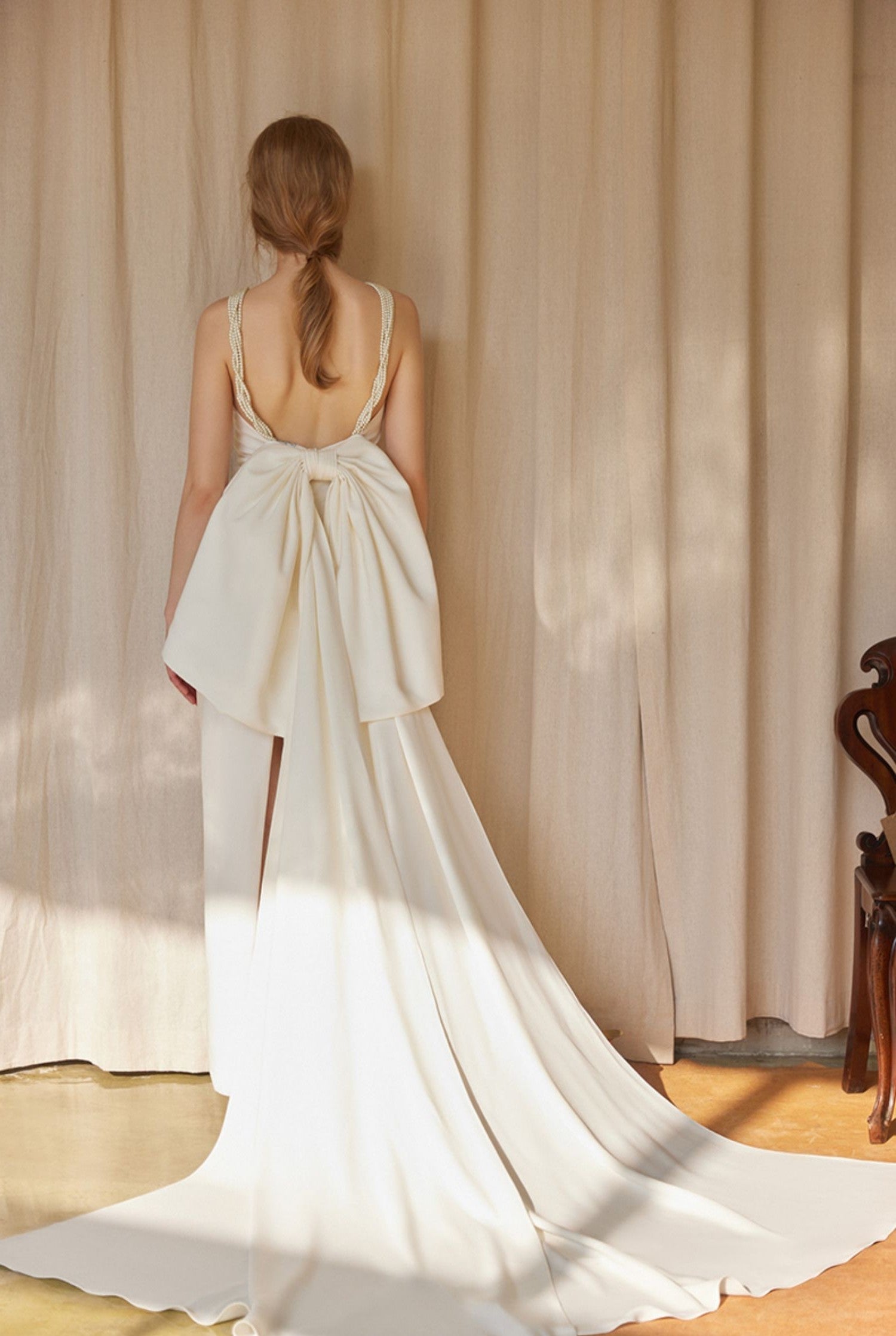 Pearl Strap Halter Satin Wedding Dress with Dramatic Back Bow and Train - Glamourous Grace