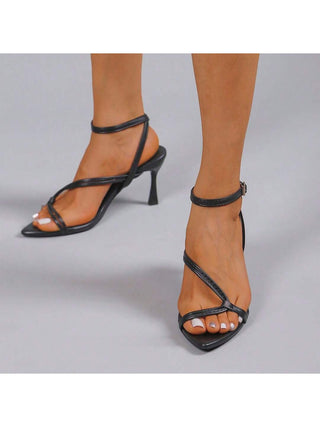 Black Charlene heels by J.Adams, stylish women's shoes with pointed toes and elegant heel design.