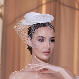 Elegant Bridal Fascinator with Beaded Details and Birdcage Veil - Glamourous Grace