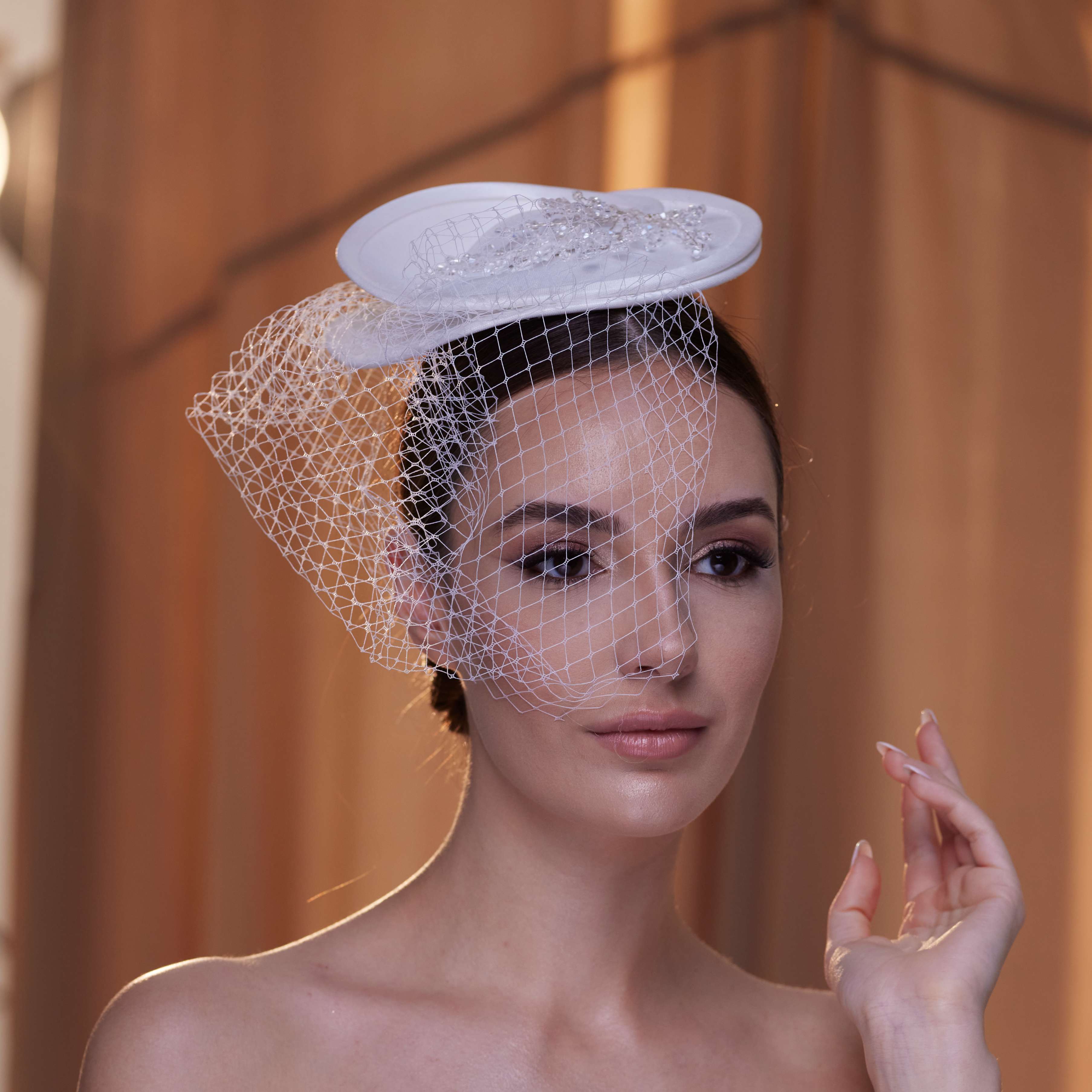 Elegant Bridal Fascinator with Beaded Details and Birdcage Veil - Glamourous Grace