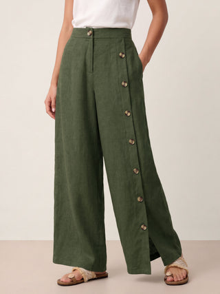 LINTICO Katya 100% linen buttoned slit-hem pants in natural beige, featuring a relaxed fit and stylish design.