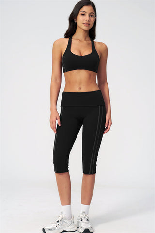 The Evoke Racerback Sports Bra Capri Leggings 2-Piece Set