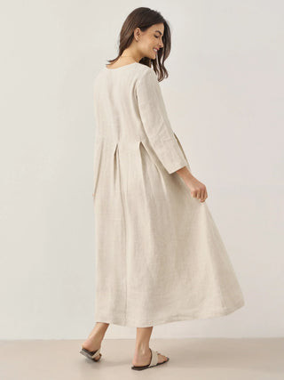 LINTICO 100% linen bateau neck pleated maxi dress with flowing silhouette and elegant design, perfect for warm weather wear.