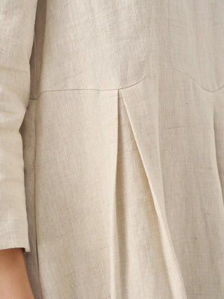 LINTICO 100% linen Bateau neck pleated maxi dress with flowing silhouette, elegant design, and pleated detailing in natural linen fabric.