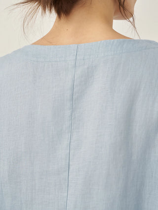 LINTICO 100% linen boatneck top with 3/4 length sleeves, showcasing a relaxed fit and natural linen fabric.