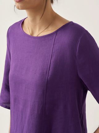 LINTICO 100% linen collarless mid-length dress with a relaxed fit, featuring a simple, elegant design and natural linen fabric.