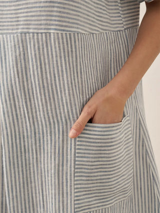 LINTICO Morgan linen pinstripe midi dress with short sleeves, featuring paneled design and a relaxed, stylish fit.