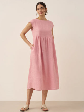 LINTICO Joan washed linen maxi dress with cap sleeves, lightweight and breezy, perfect for warm weather, natural fabric texture visible.