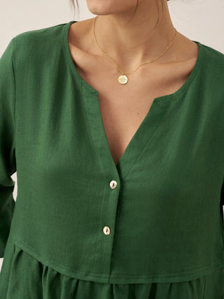 LINTICO 100% linen loose fit maxi dress with button waist and gathered design, styled for a relaxed, elegant look.