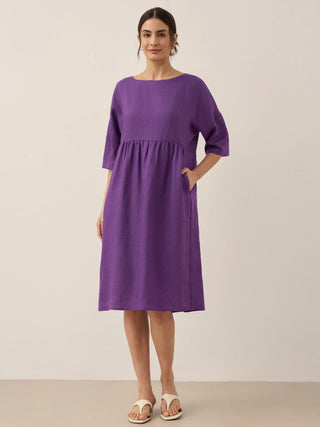 LINTICO 100% linen A-line midi dress with button details and sleeveless design, perfect for casual summer wear.