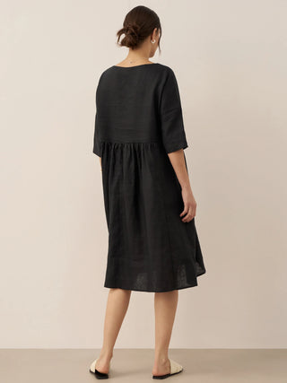 LINTICO 100% linen A-line midi dress in Valencia style, featuring a flowy silhouette and natural fabric for a breezy look.