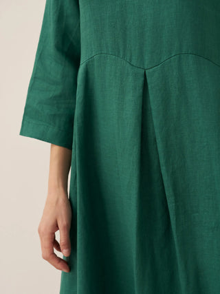 LINTICO 100% linen Bateau neck pleated maxi dress with flowing silhouette and elegant design, perfect for warm weather.