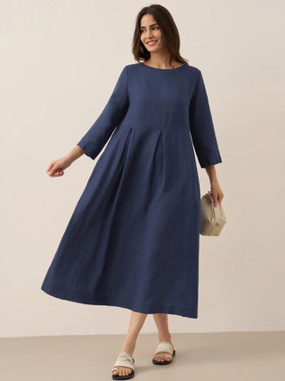 LINTICO 100% linen Bateau neck pleated maxi dress with flowing silhouette and elegant design, perfect for summer wear.