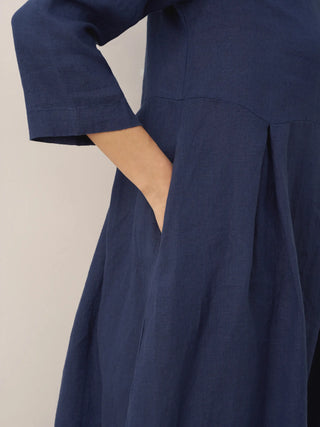 LINTICO 100% linen Bateau neck pleated maxi dress with flowing silhouette and elegant design, perfect for warm weather wear.