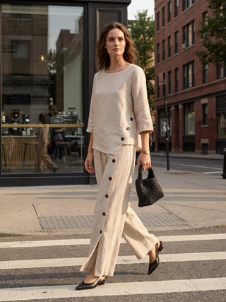 LINTICO linen top with asymmetric hem and button trim, featuring lightweight, breathable 100% linen fabric and stylish design.
