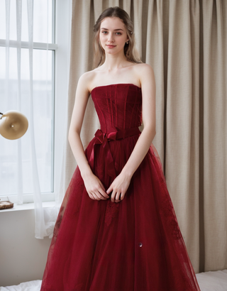 Elegant Strapless Burgundy Tulle Ball Gown with Corset Back and Ribbon Tie - Glamourous Grace