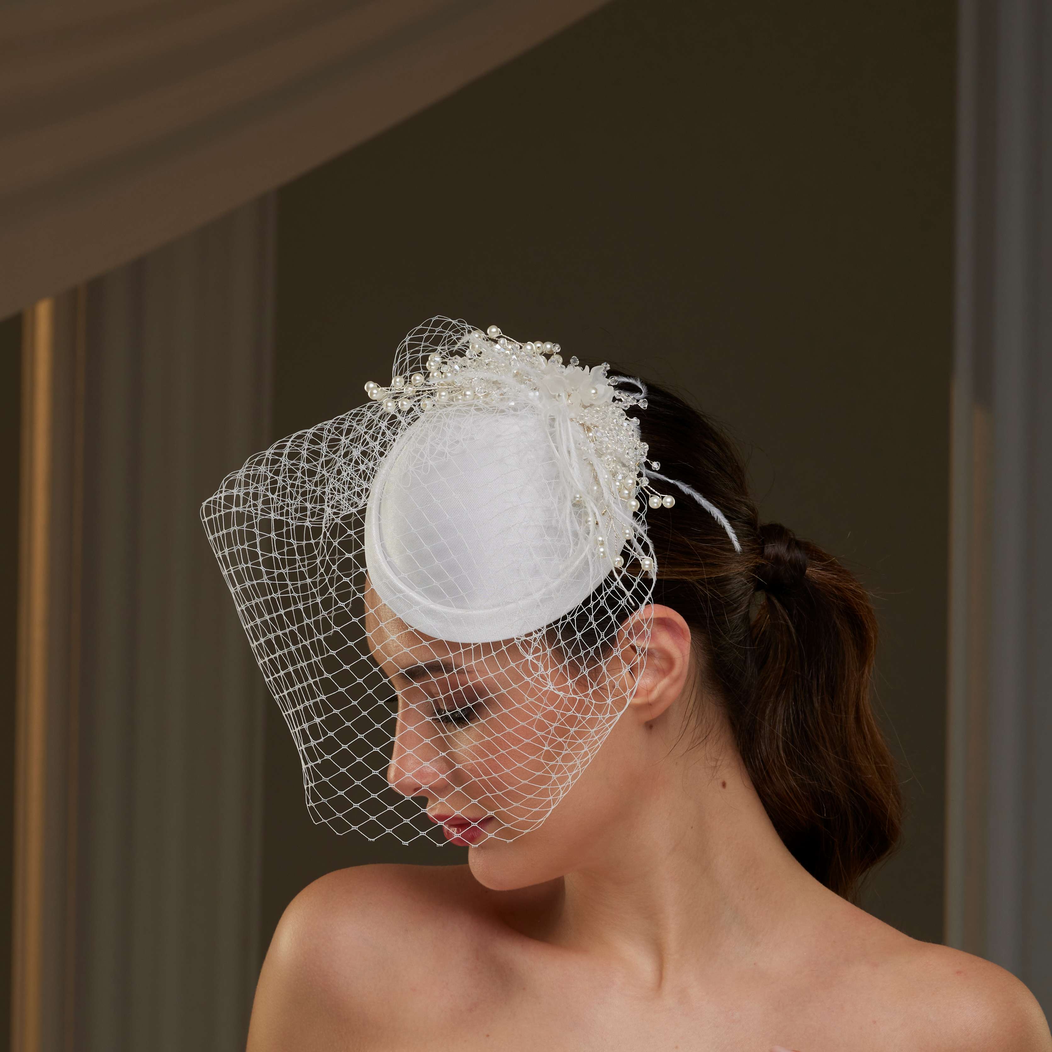 Elegant  Bridal Fascinator with Birdcage Veil, Pearls & Feathers - Glamourous Grace