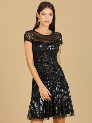 Lara New York cap sleeve sequin short dress featuring a fitted silhouette and shimmering sequin embellishments.