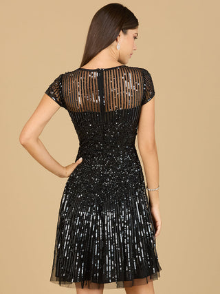 Lara New York cap sleeve sequin short dress with a fitted silhouette and shimmering sequins, perfect for evening wear.