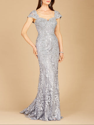 Lara New York fitted lace mermaid gown, elegant dress with intricate lace details and a form-fitting silhouette on a model.