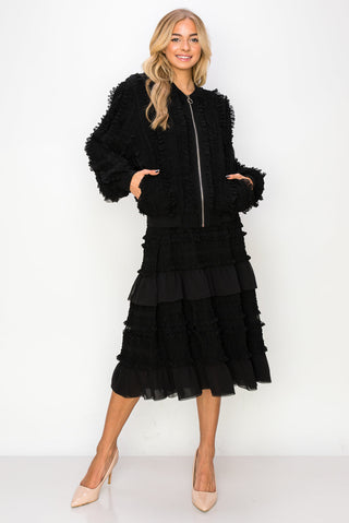 Black Willa Lace Ruffled Skirt by Joh Apparel, featuring intricate lace detailing and feminine ruffles.