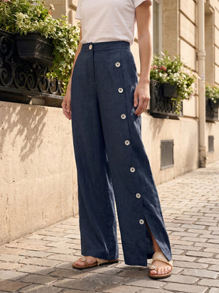 LINTICO Katya 100% linen buttoned slit-hem pants in natural beige, featuring a relaxed fit and stylish design.