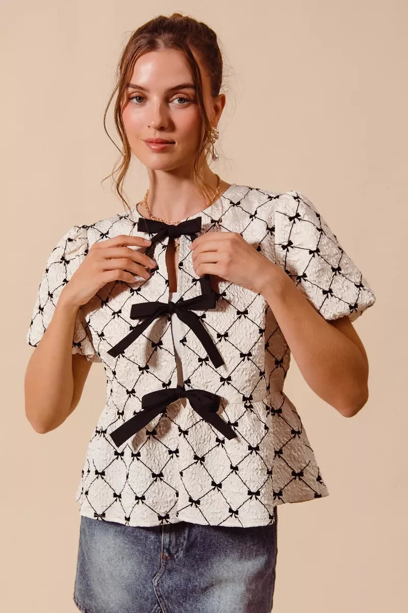 SO ME Bow Texture Woven Peplum Top With Contrast Tie - Glamourous Grace