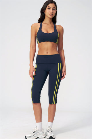 The Evoke Racerback Sports Bra Capri Leggings 2-Piece Set