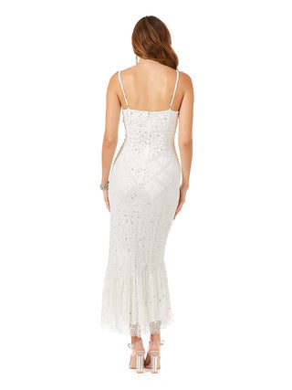 Lara New York Lara Fae V-Neck Spaghetti Strap wedding gown with flowing fabric and elegant design, perfect for bridal occasions.