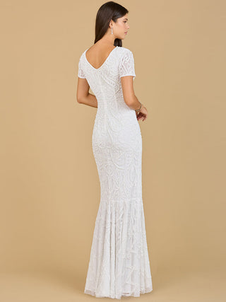 Lara New York cap sleeve beaded wedding gown with intricate beadwork and elegant silhouette for special occasions.