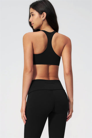 The Evoke Racerback Sports Bra Capri Leggings 2-Piece Set